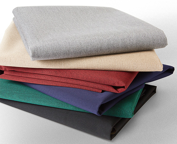 Sunbrella Seamark marine fabric bolts, six colors stacked.