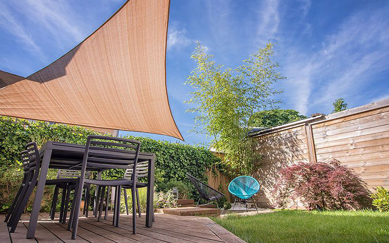 Backyard shade sail. By Goodwin-Cole.