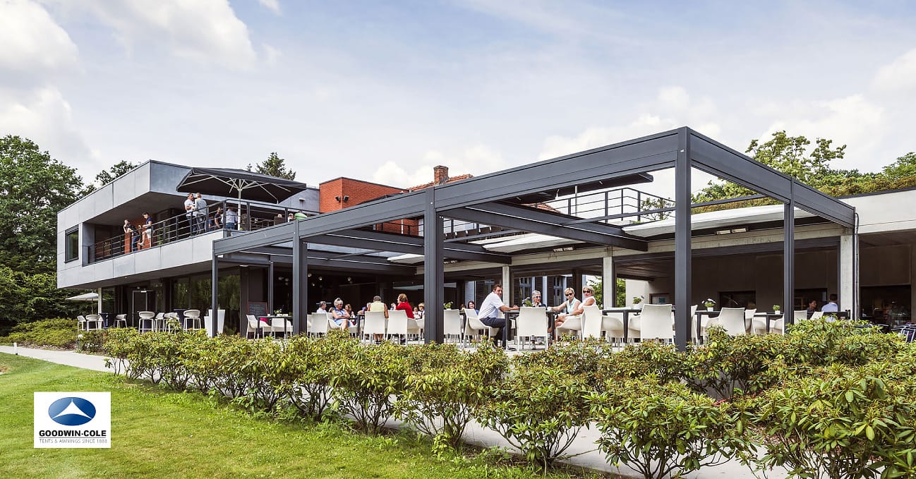 Large pergola for outdoor restaurant seating.