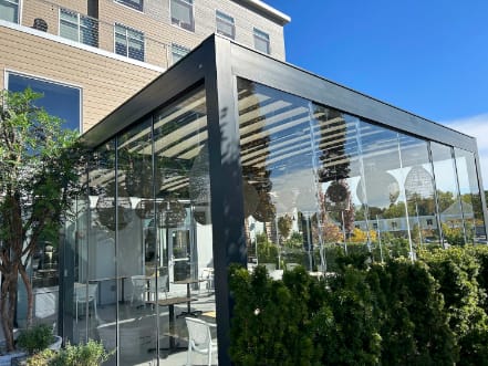 Isola 3 pergola with glass walls.