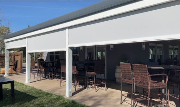 Patio with new roller shades installed