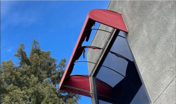 Metal awning cover that is falling apart